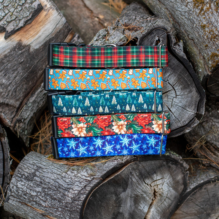 Stack of colorful patterned Christamss collars on a wooden surface