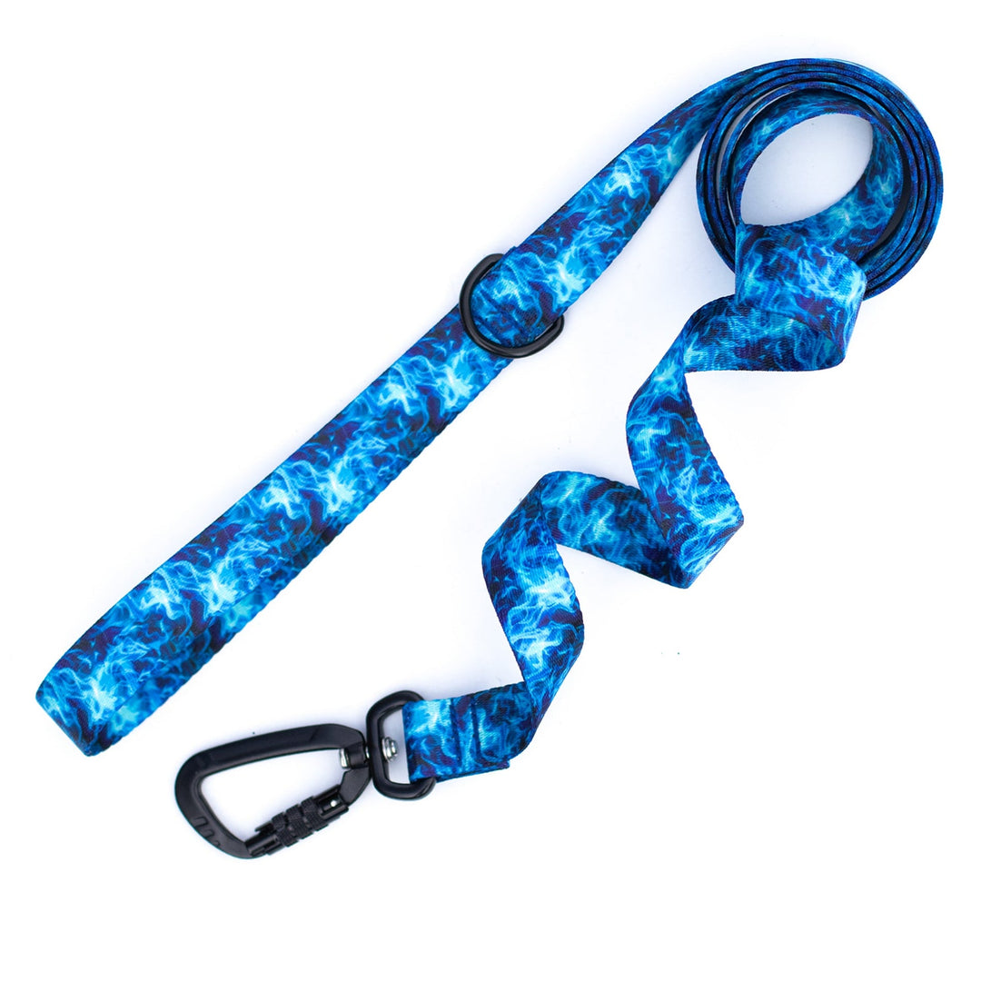 Blue tie-dye dog leash with black carabiner on a white background