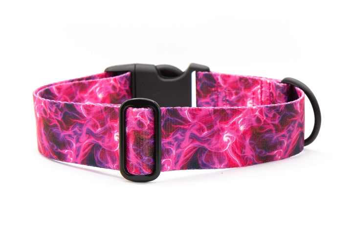Dog collar with pink and purple flame pattern on a white background