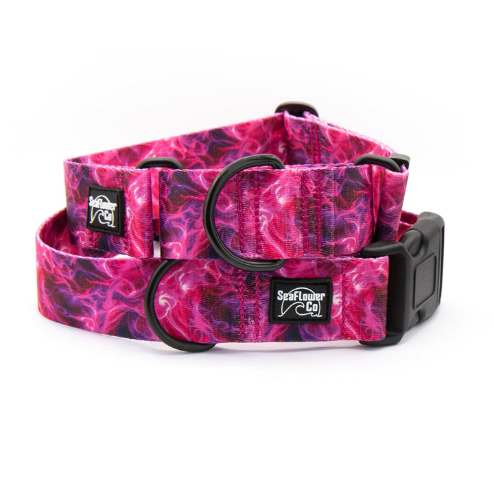 Pink and black patterned dog collar with visible brand logo on a white background