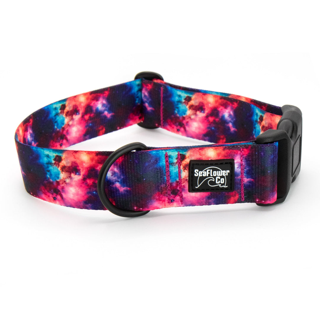 Colorful galaxy-patterned dog collar on a white background