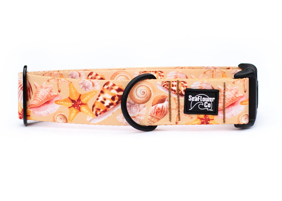 Dog collar with seashell pattern and Seaflower Co logo on a white background
