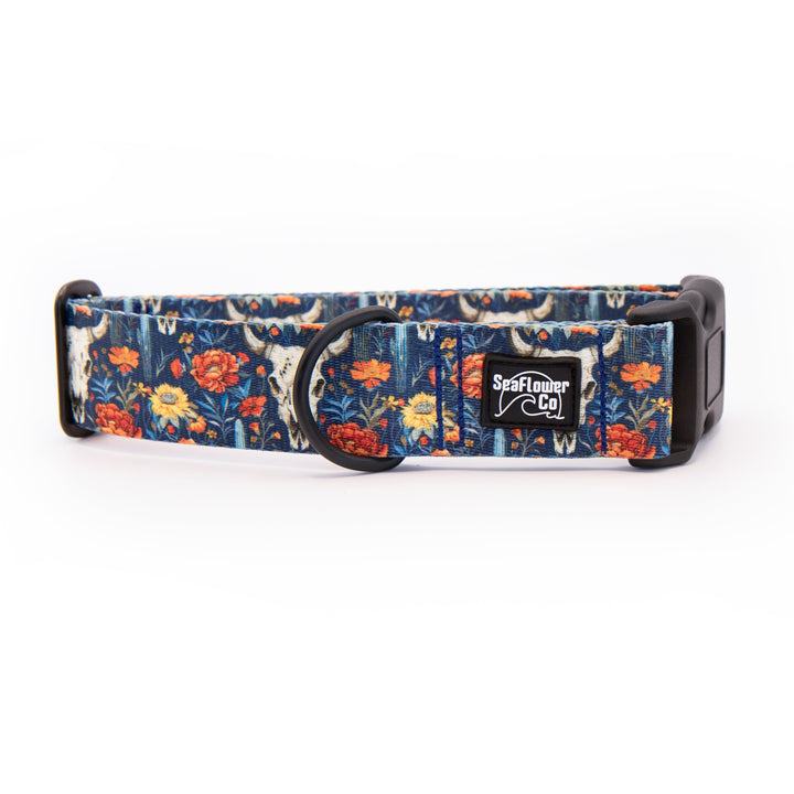 Floral patterned dog collar with a brand label on a white background