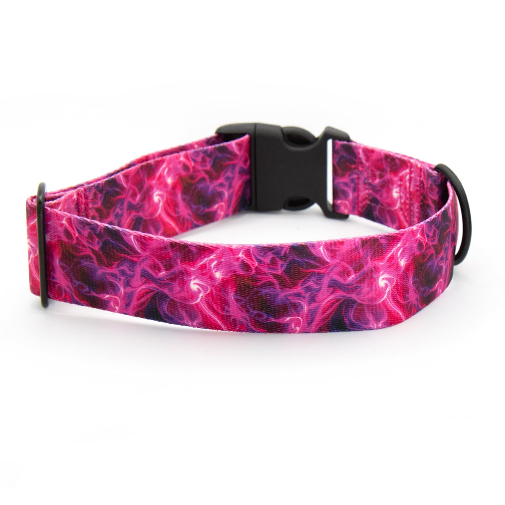 Pink and purple patterned dog collar with a brand label on a white background